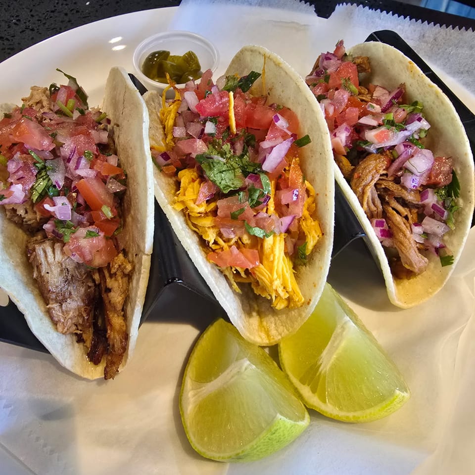 Venezuelan-style tacos with meat, pico de gallo and lime.
